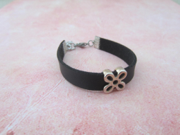 armband zwart leder/schuifkraal bloem